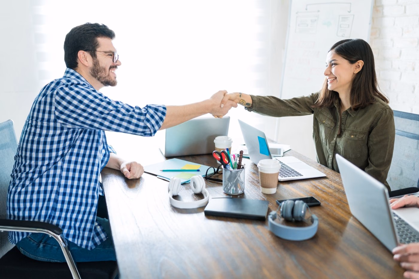 Un rendez-vous client en visio, notes prises pendant l'appel